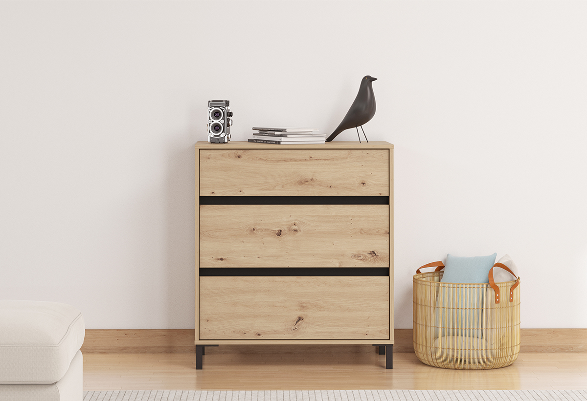 Απεικονίζεται η συρταριέρα σε δωμάτιο.